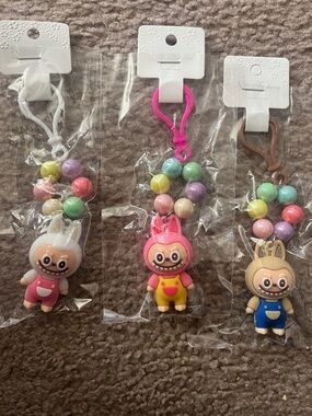 Choice of One Monster Kids Character Keychain - Pink, White, Beige